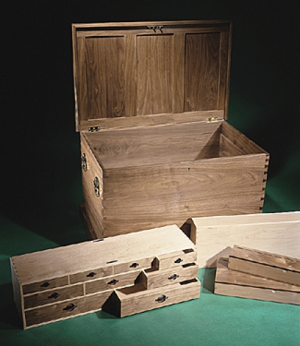 Cabinetmaker's Chest in American black walnut with variably spaced through dovetails. 9H x 31W x 8D